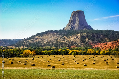 Photography Devils Tower in the Fall with hay fields