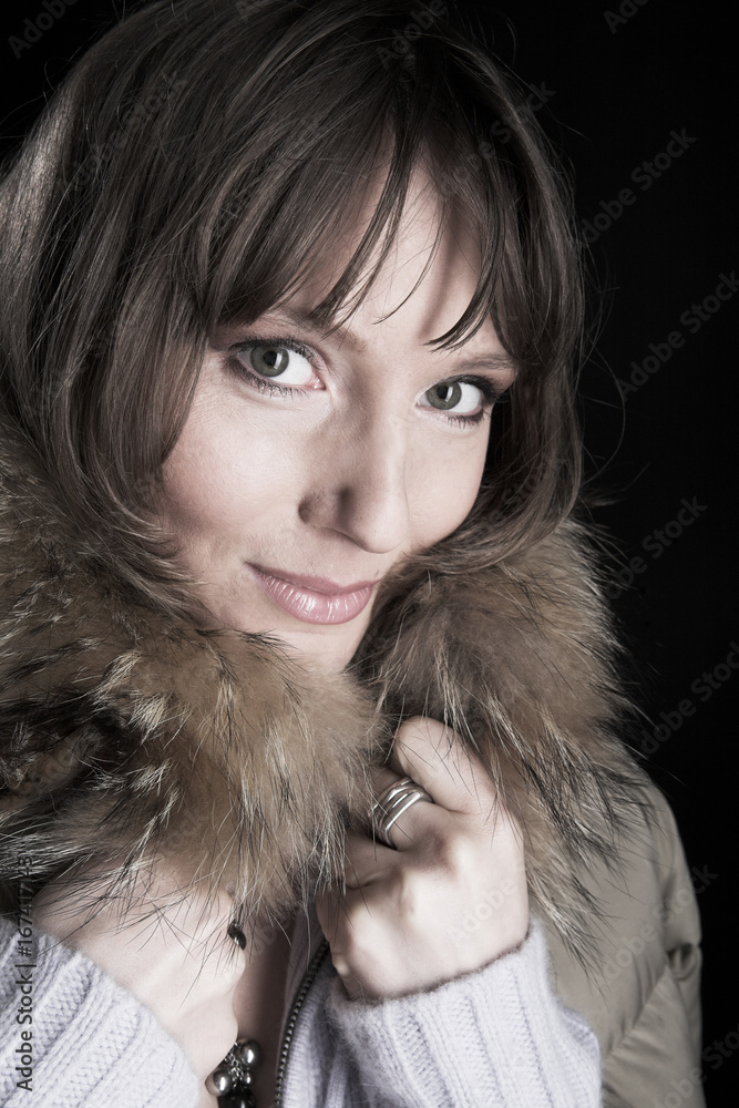 young woman over black background young woman over black background
