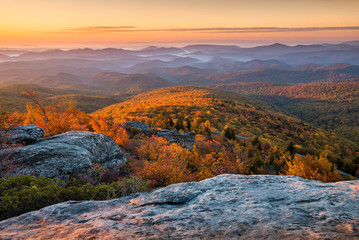 Leinwandbilder Lavendelfarbene Motive Scenic sunrise over fall foliage, Blue Ridge Mountains, North Carolina.  © aheflin