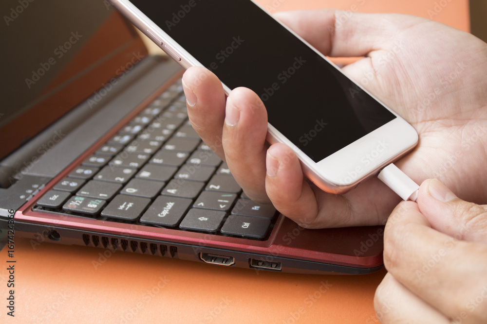 smartphone connected with notebook for connecting business smartphone connected with notebook for connecting business
