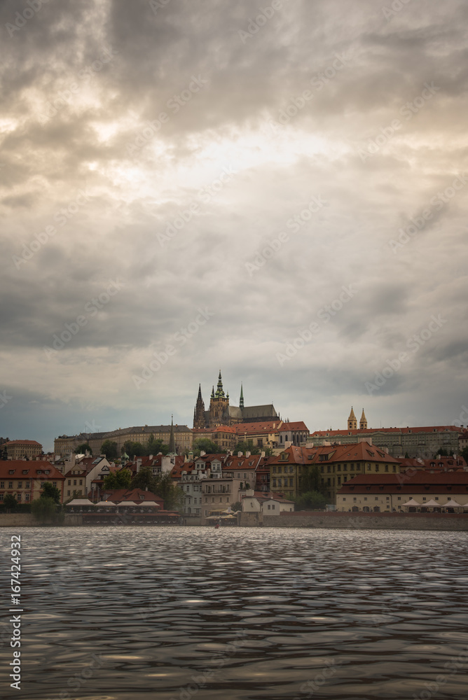 Vertical Prague Castle with cloudy sunset .