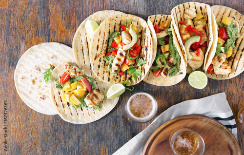Corn tortillas with grilled chicken fillet, guacamole sauce and beer