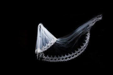 wedding white Bridal veil on black background isolated