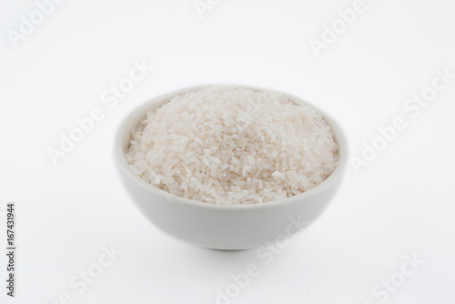 white rice, natural long rice grain for background and texture on white background