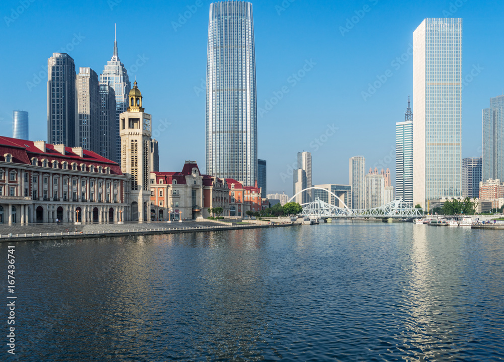 Obraz premium Tianjin city waterfront downtown skyline with Haihe river,China.