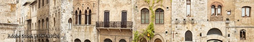 long panorama of windows in Tuscany houses in Italy © sergejson