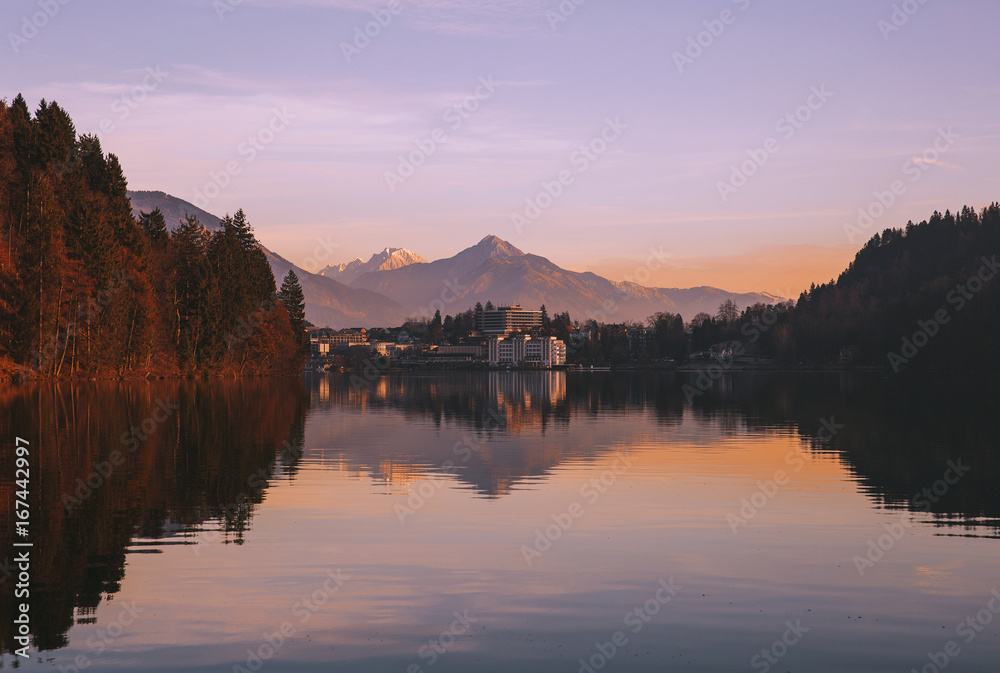 View on Bled village with snowy Alps on background.