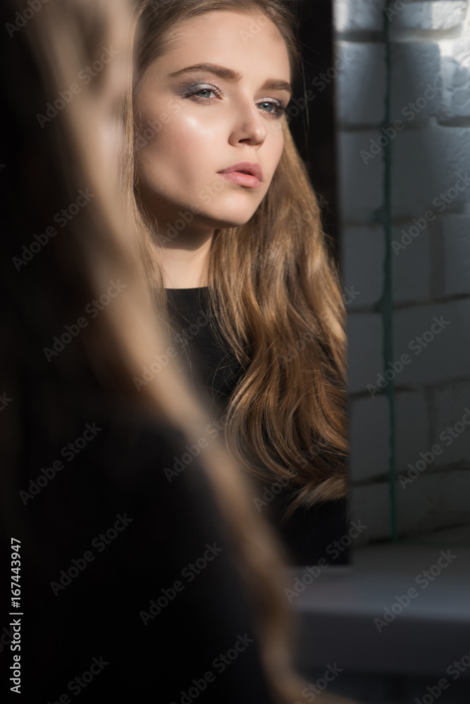 Fototapeta premium Girl look at mirror.