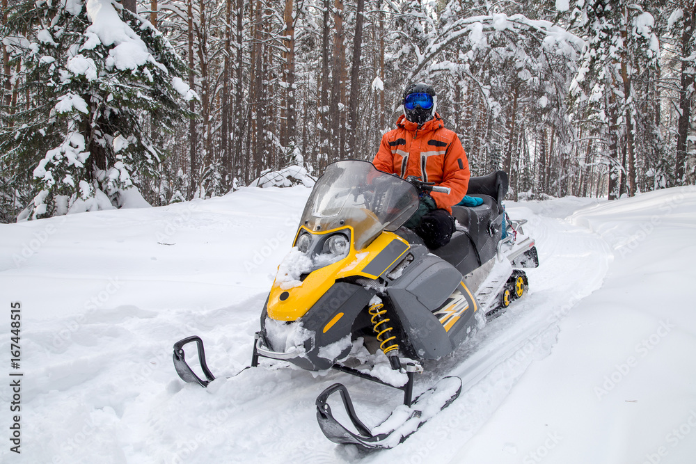 Athlete on a snowmobile