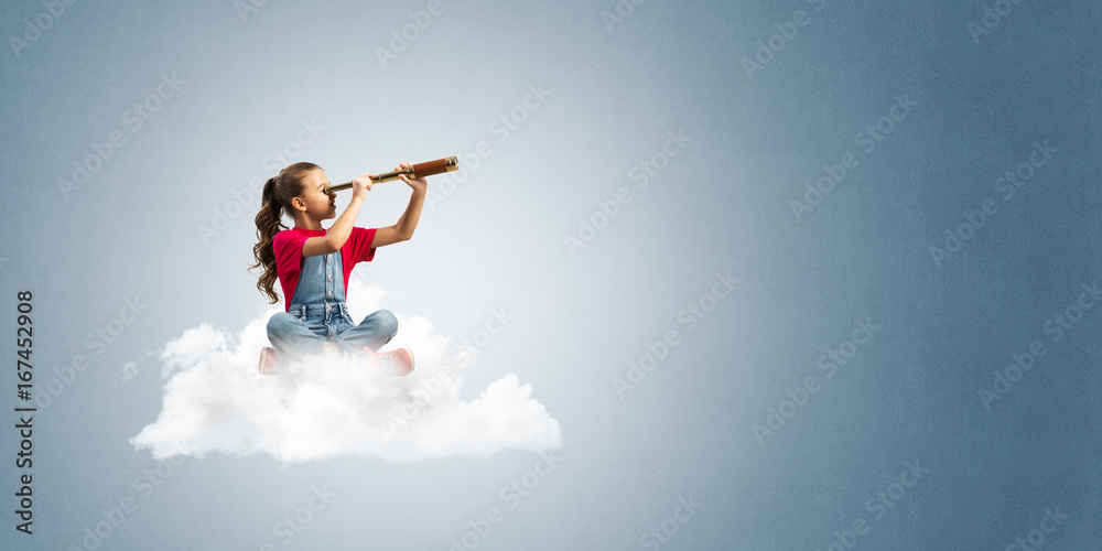 Concept of careless happy childhood with girl dreaming about future Concept of careless happy childhood with girl dreaming about future