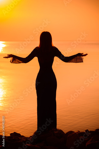 Legends and myths about kings and gods about mortals and immortals, beautiful stories. Woman witch sorceress on sunset background. Illustrations to fairy tales. © T.Den_Team