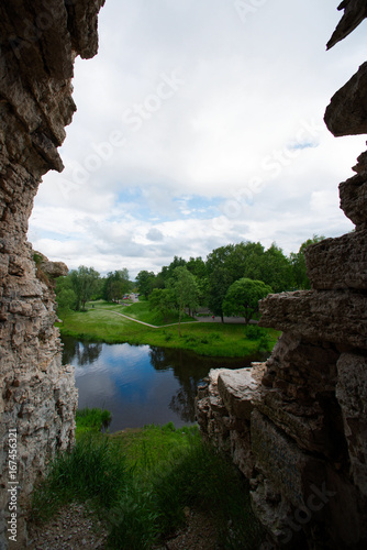 View of the city park from the arch of the medieval tower photo