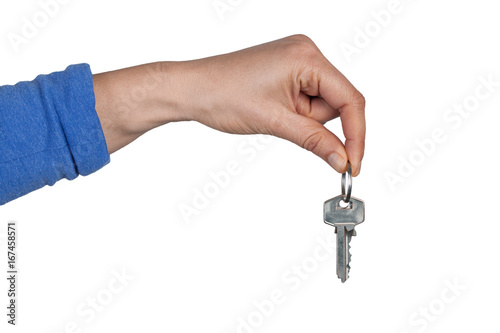 Woman hand holding home keys isolated on white background with copy space