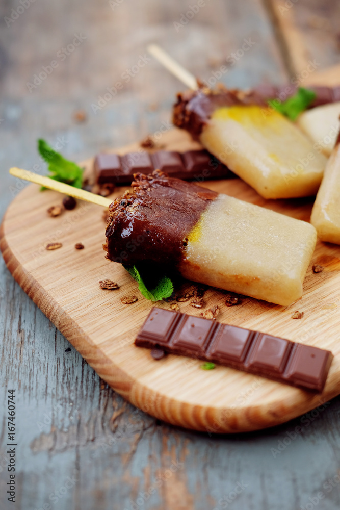 Homemade ice cream. Chocolate banana granola popsicles. Homemade ice cream. Chocolate banana granola popsicles.