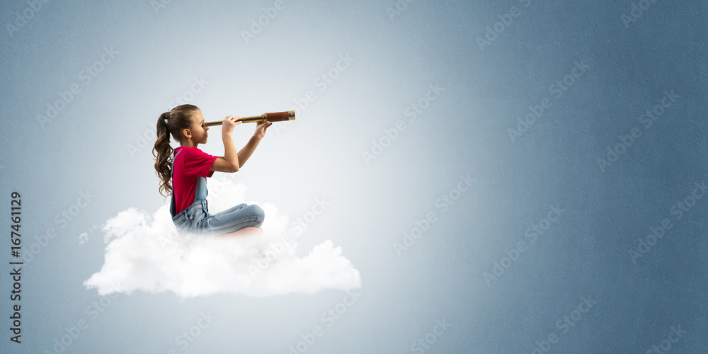 Concept of careless happy childhood with girl dreaming about future Concept of careless happy childhood with girl dreaming about future