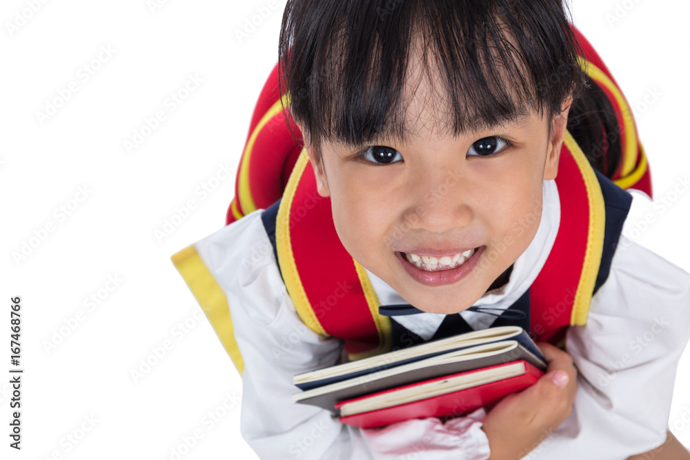 Asian Chinese primary school girl sitting on the floor Asian Chinese primary school girl sitting on the floor