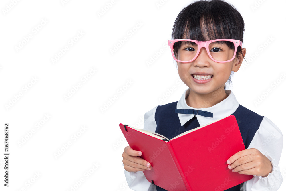Asian Chinese primary school girl in uniform reading book Asian Chinese primary school girl in uniform reading book