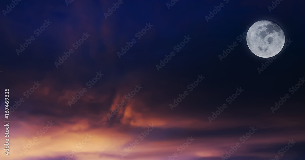 Dramatic atmosphere Panorama view of sunset sky and full moon.Image of full moon furnished by NASA.