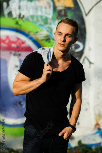 fashion man model on graffity wall