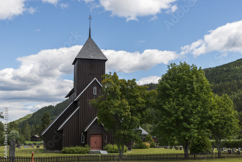 brown wooden stave church in Norway