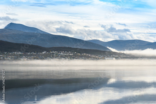 Misty fog over the lake, Tromso, Norway