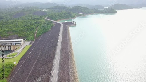 Shore of Cheow Lan Lake from above, road going to the distance, Mountain hills, silence
