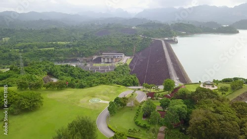 Shore of Cheow Lan Lake from above, road, Mountain hills, small village
