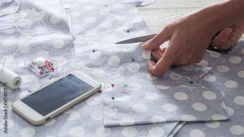 cutting fabric polka dot sewing the pattern photo