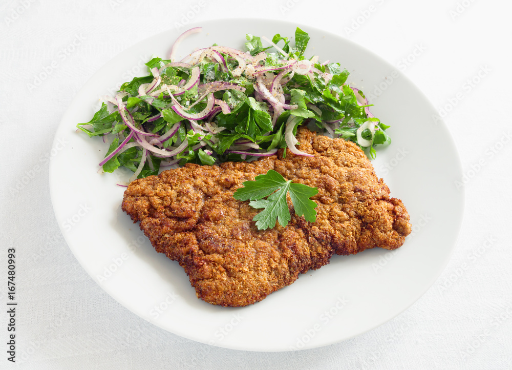 breaded beef with parsley onion salad breaded beef with parsley onion salad