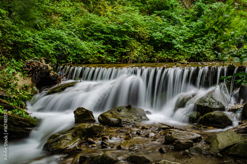 Landscape of waterfall Shypit in the Ukrainian Carpathian Mountains on the long exposure