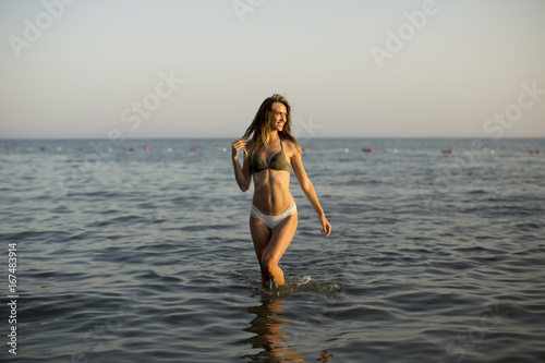 Pretty young woman in the sea