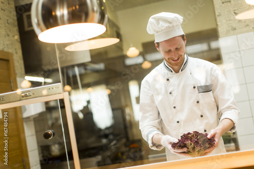 Young chef preparing a meal