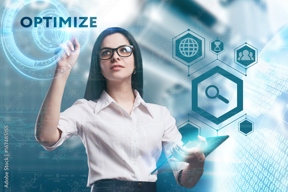 The concept of business, technology, the Internet and the network. A young entrepreneur working on a virtual screen of the future and sees the inscription: Optimize The concept of business, technology, the Internet and the network. A young entrepreneur working on a virtual screen of the future and sees the inscription: Optimize