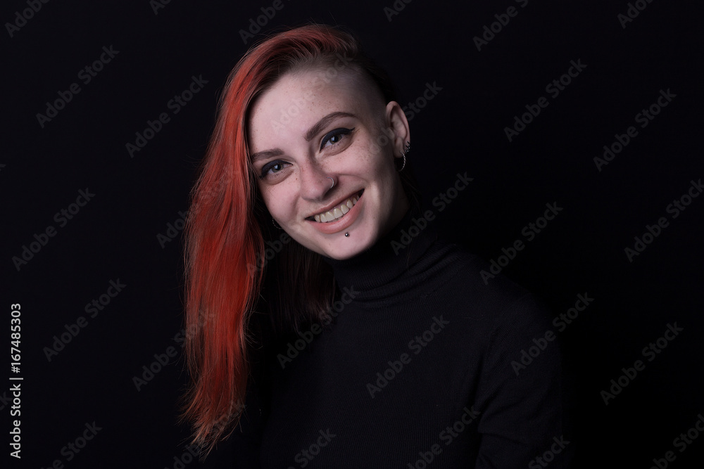 red hair girl posing in studio