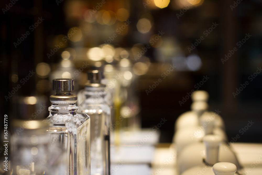 perfume bottles in store display shelf perfume bottles in store display shelf