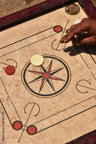 Children play carrom in Nepal