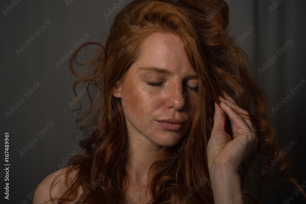 Obraz premium sensual portrait of a redheaded beautiful woman