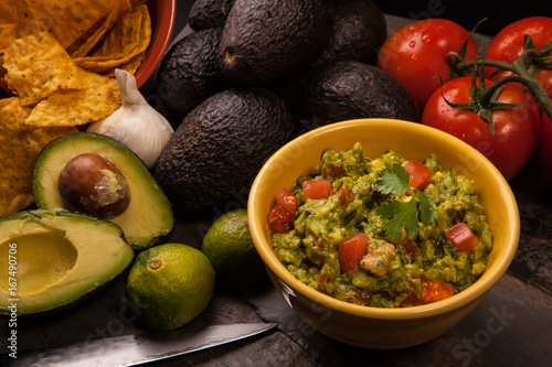 Guacamole with tomatoes, garlic, and chips 