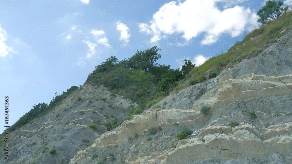 Mountains with stones and forest against the blue sky nature landscape Mountains with stones and forest against the blue sky nature landscape
