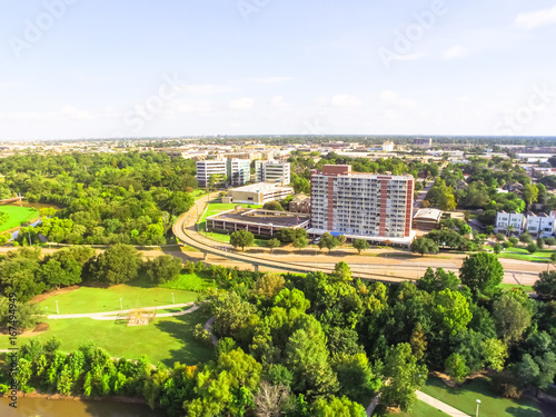 Aerial view of Washington heights ward from Eleanor Tinsley Park, with Buffalo Bayou river and Intersection of Memorial Dr and Sawyer St. Green park, residential and office buildings. photo