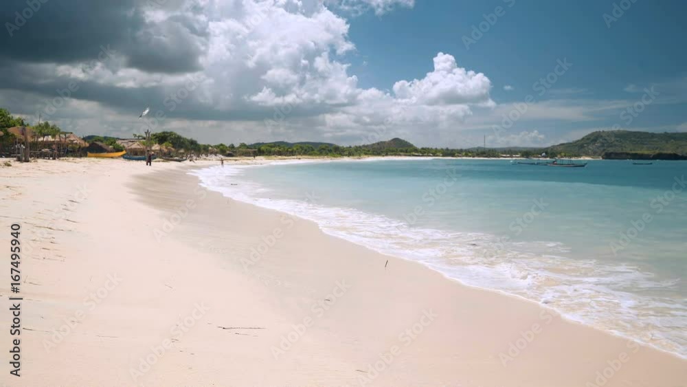 White sand beach Tanjung Aan with turquoise water in Lombok, Indonesia. Shot with Sony a7s and Atomos Ninja Flame on sunny day. White sand beach Tanjung Aan with turquoise water in Lombok, Indonesia. Shot with Sony a7s and Atomos Ninja Flame on sunny day.