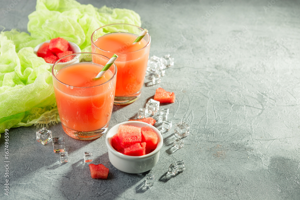 Two bottles of watermelon juice Two bottles of watermelon juice