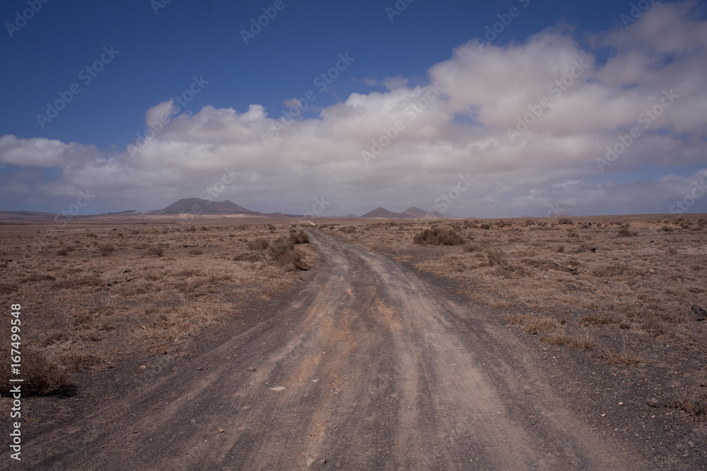 empty dirt road in the desert. Lanzarote