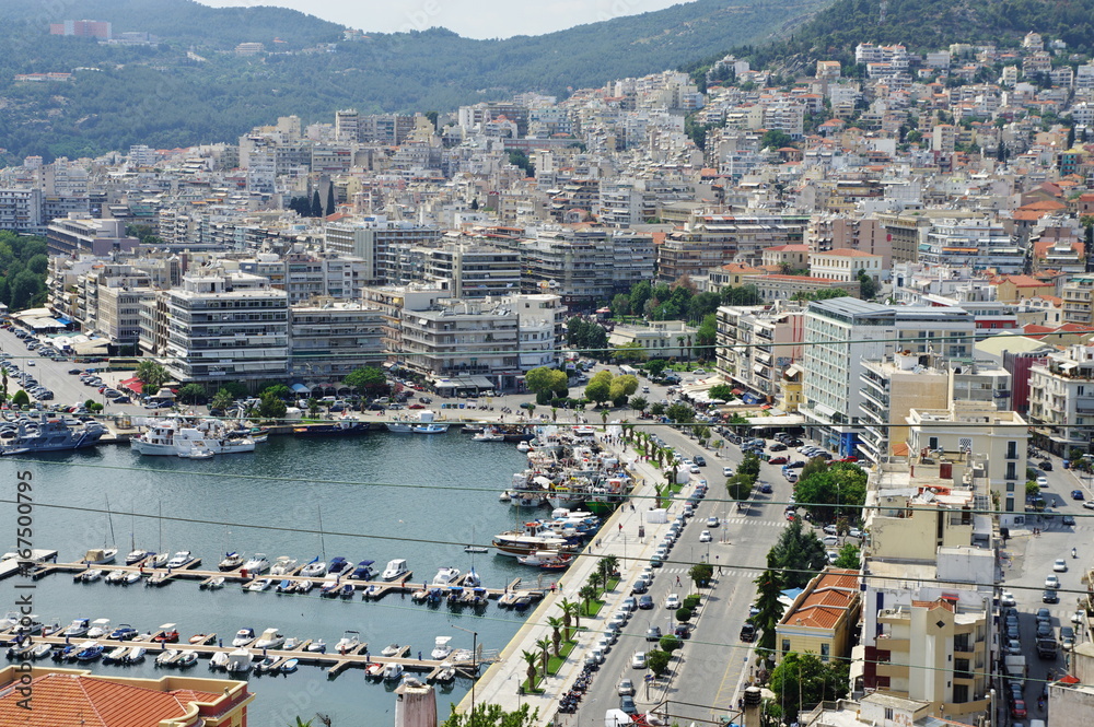 Fototapeta premium Kavala, city in northern Greece, in the Macedonia-Thrace region, located on the Aegean Sea. View of the harbor and a part of the city.