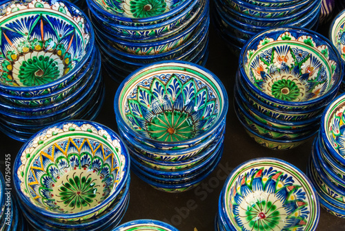 Decorative ceramic cups with traditional blue and green Near East ornament at the street open air market, Moscow, Russia.