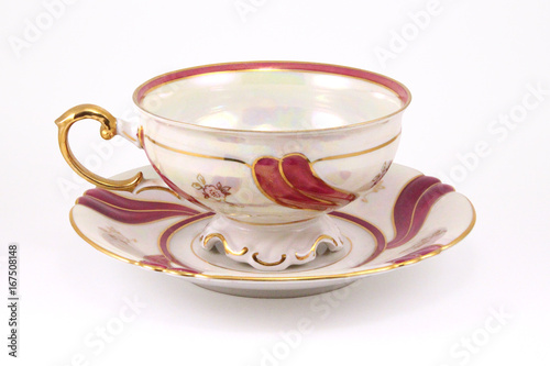 vintage Cup and saucer with gold decoration