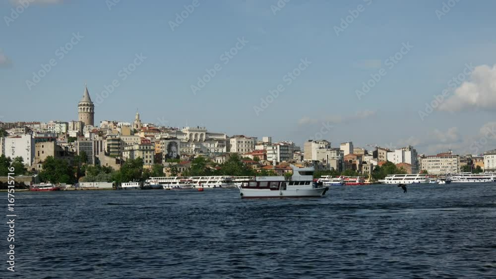 Ferry at the Golden Horn with Galata Tower at the background in Istanbul Turkey Ferry at the Golden Horn with Galata Tower at the background in Istanbul Turkey