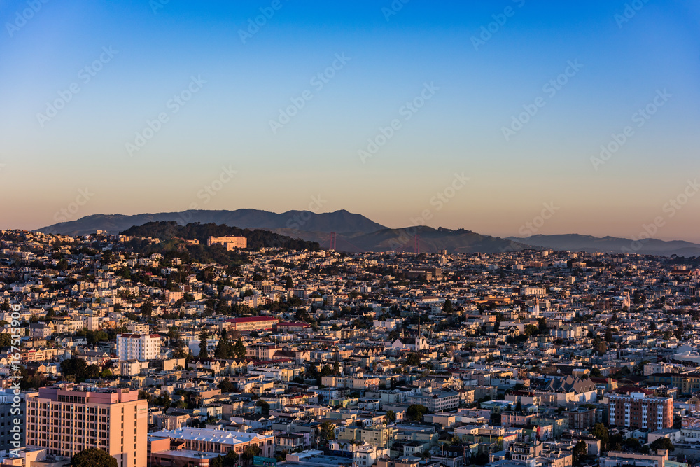 The Golden Gate Bridge through San Francisco at Sunrise.