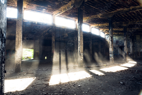 Fire damaged interior of a large train roundhouse and depot in upstate New York