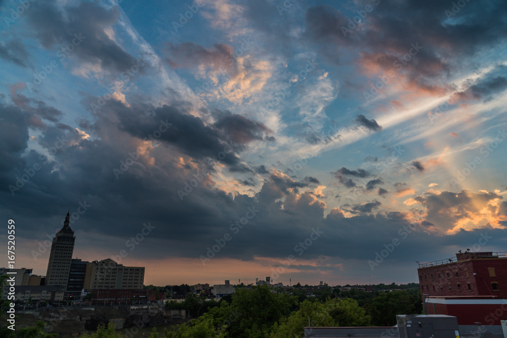 Colorful sunset sky over the high falls in downtown Rochester New York Colorful sunset sky over the high falls in downtown Rochester New York